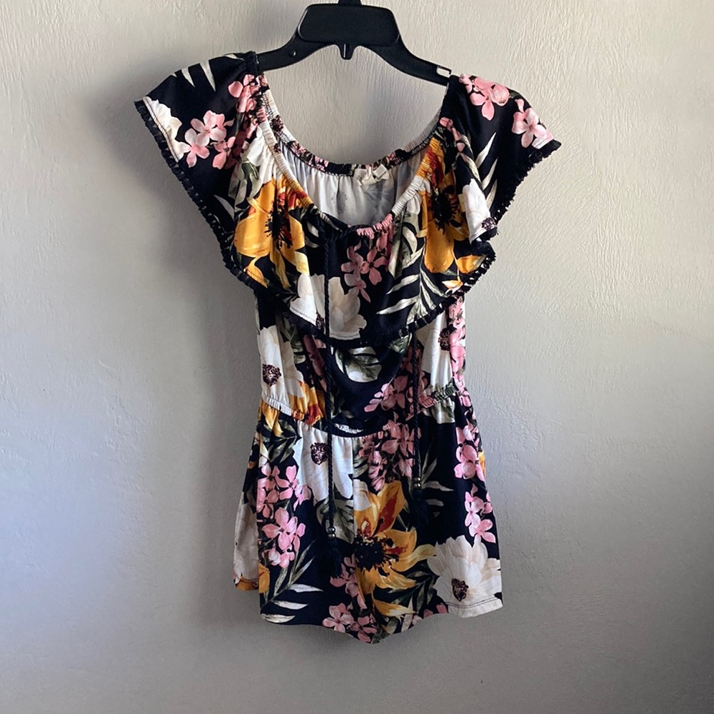 Multi flowered romper with black tassel tie